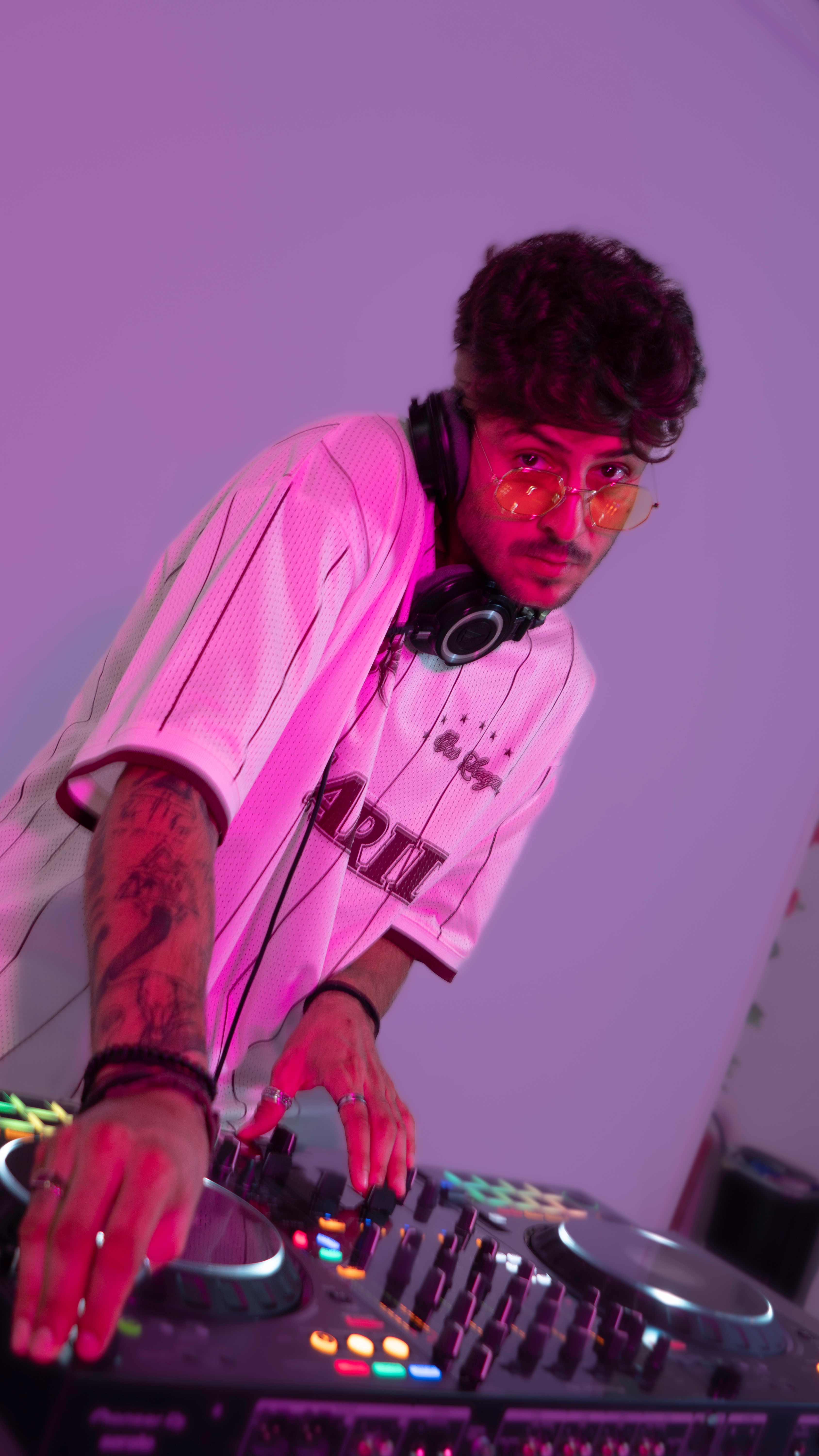 PICAZZO at the DJ booth in pink light